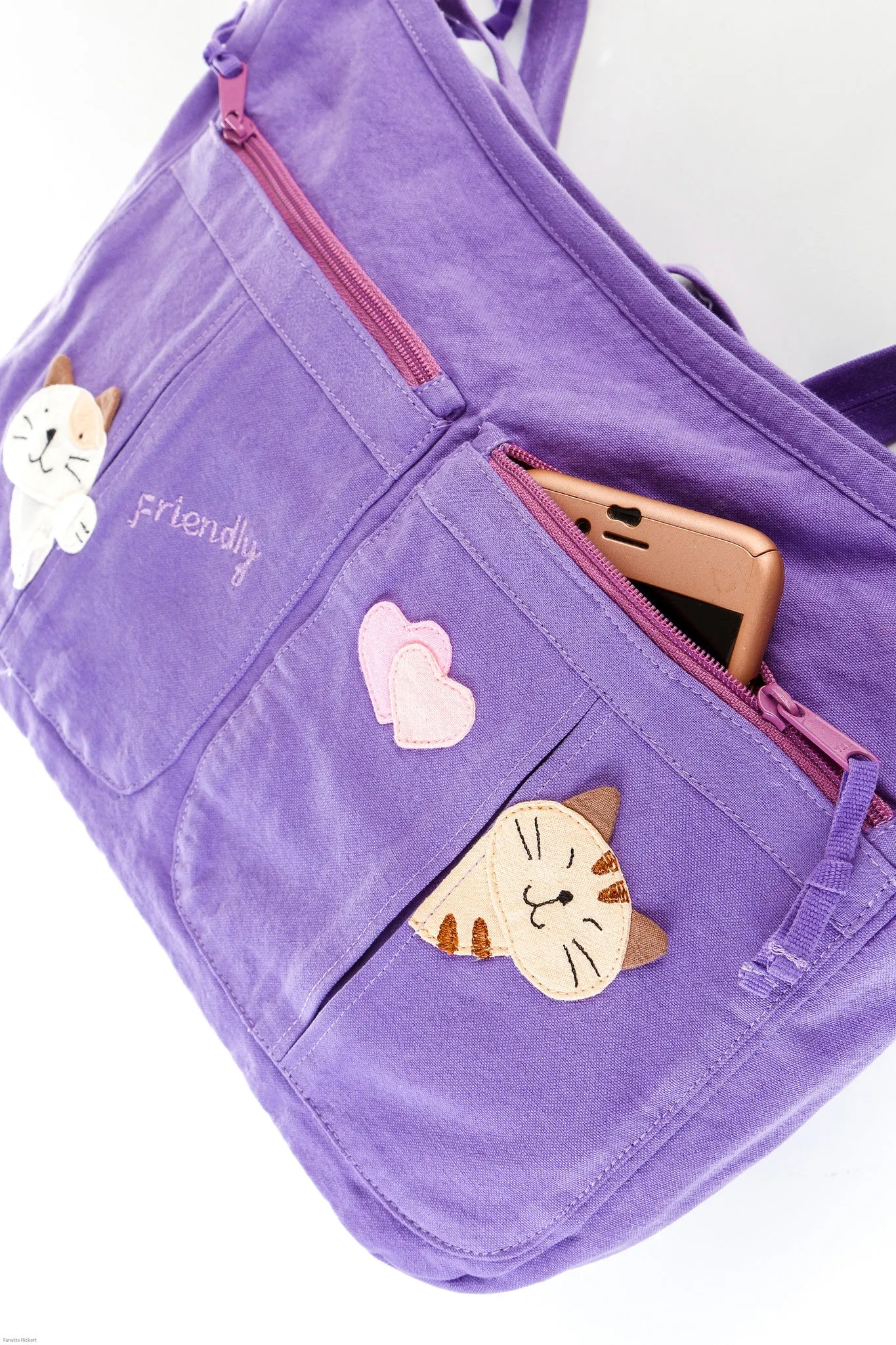 Cara Cat Motto Crossbody Bag