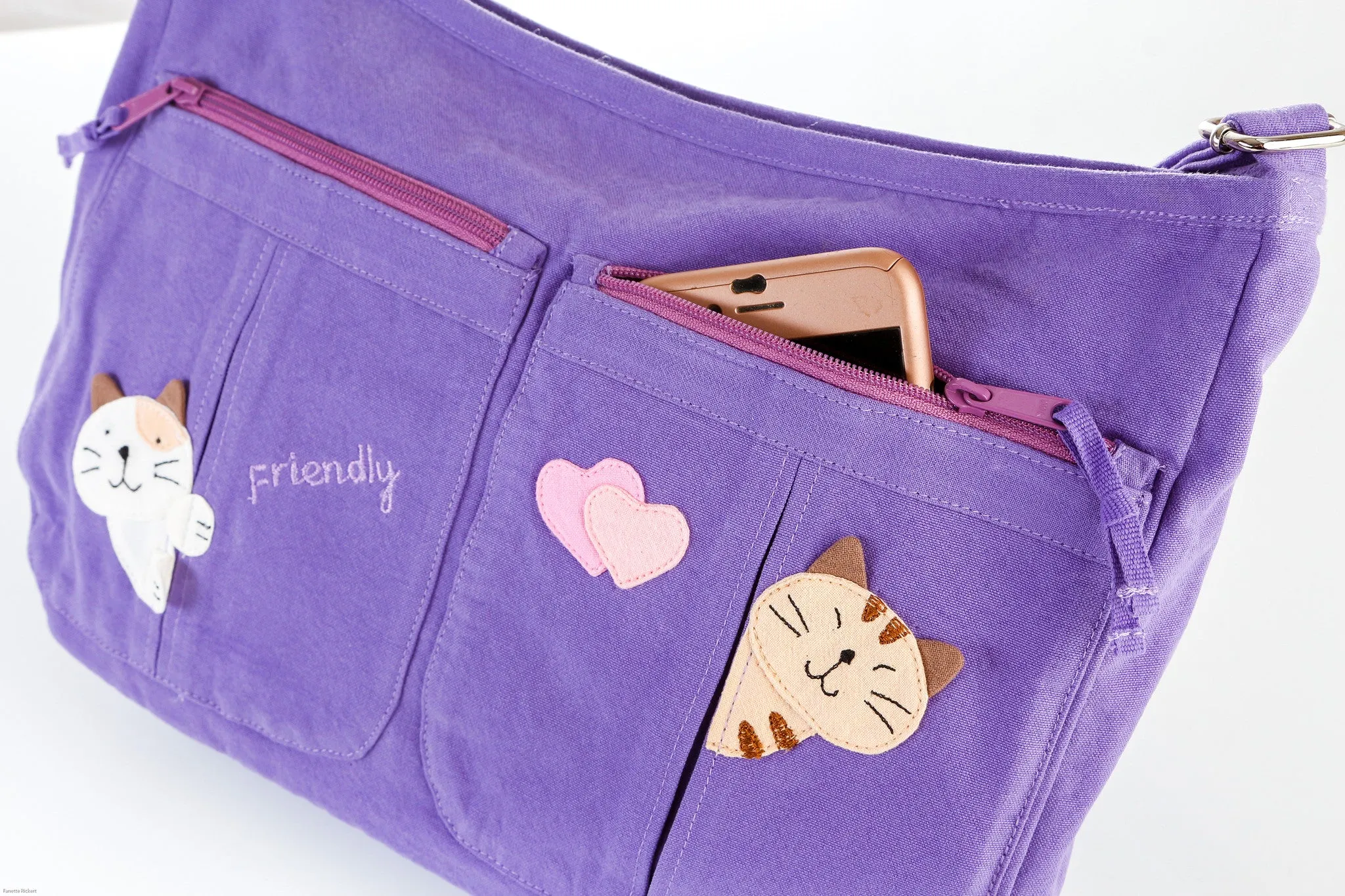 Cara Cat Motto Crossbody Bag