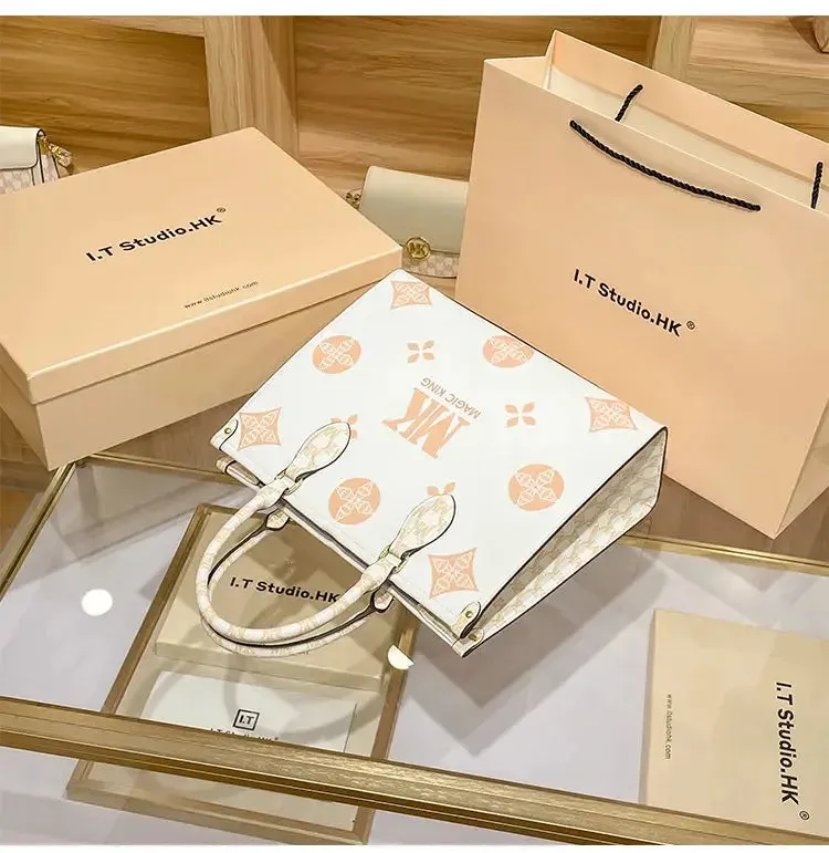MAGIC KING authentic leather women's bag 2023 new autumn large capacity senior sense commuter hand bill of lading shoulder bag