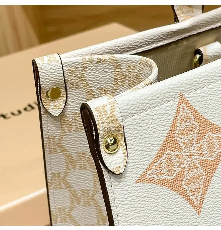 MAGIC KING authentic leather women's bag 2023 new autumn large capacity senior sense commuter hand bill of lading shoulder bag
