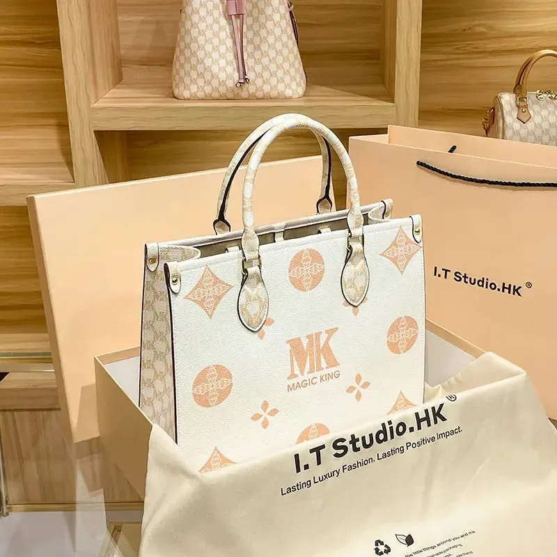 MAGIC KING authentic leather women's bag 2023 new autumn large capacity senior sense commuter hand bill of lading shoulder bag