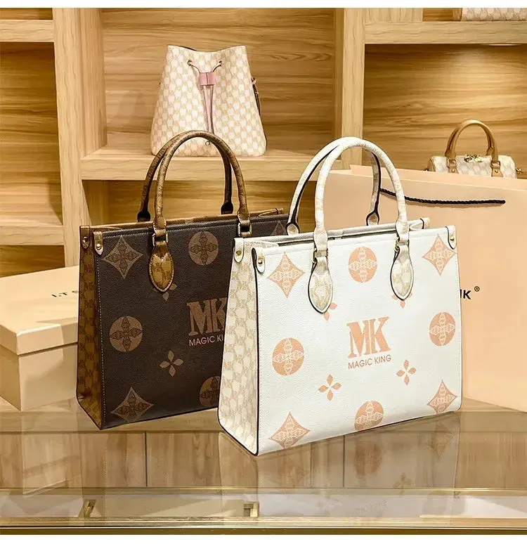 MAGIC KING authentic leather women's bag 2023 new autumn large capacity senior sense commuter hand bill of lading shoulder bag