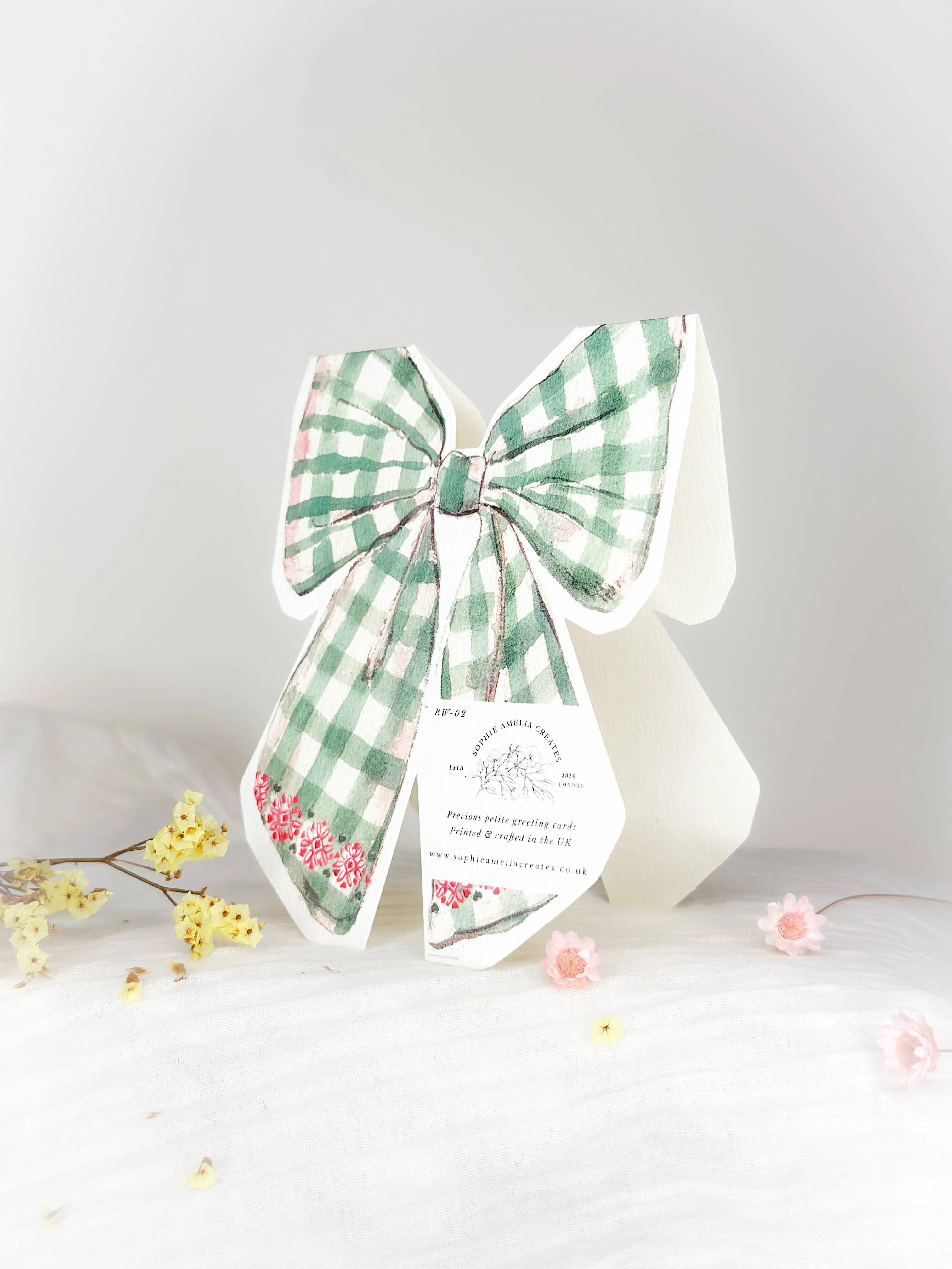 Season's Greetings bow shaped Christmas card